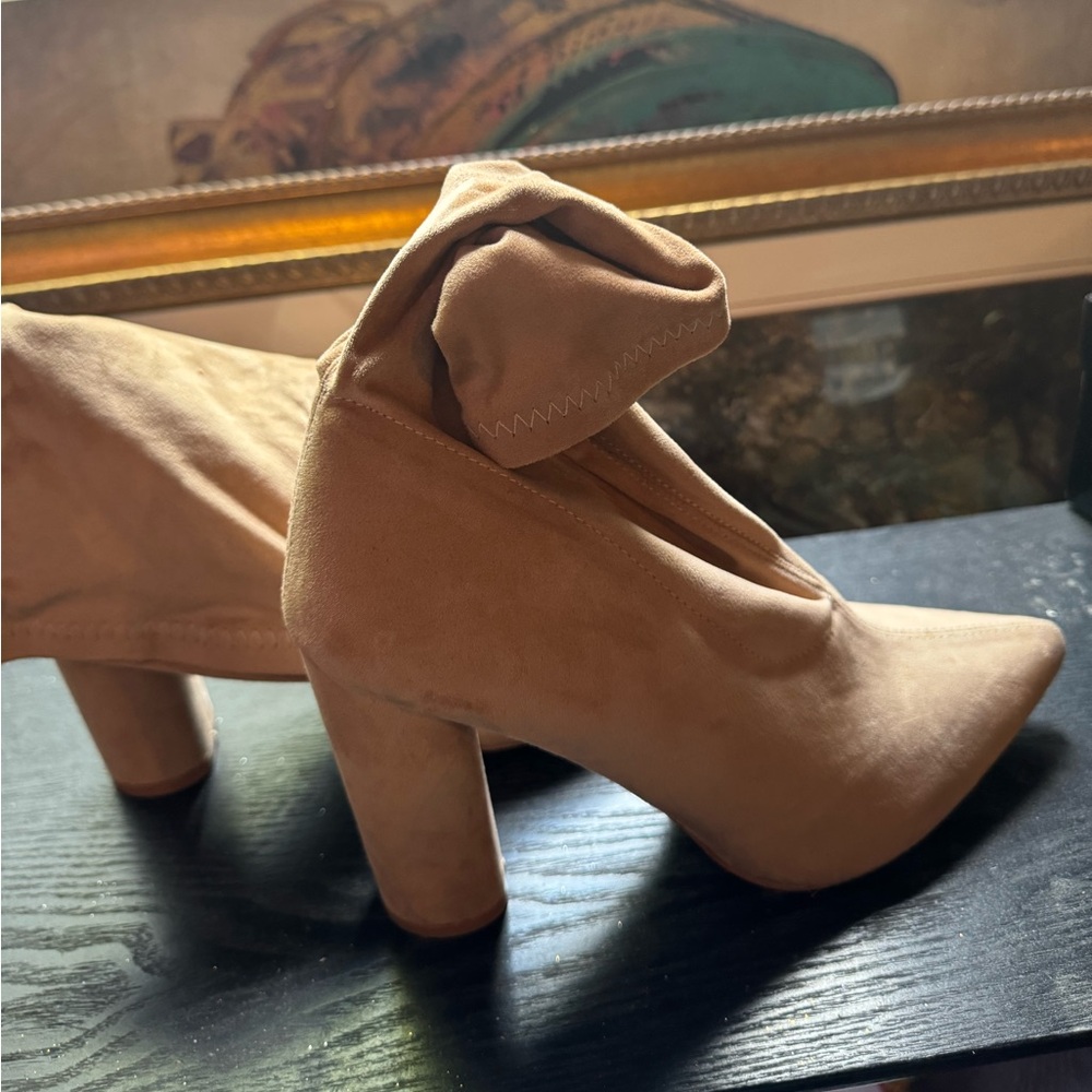 Pink heeled boots